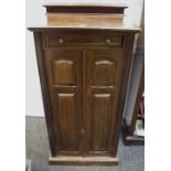 A tall music cabinet, faux drawer, swinging slide,