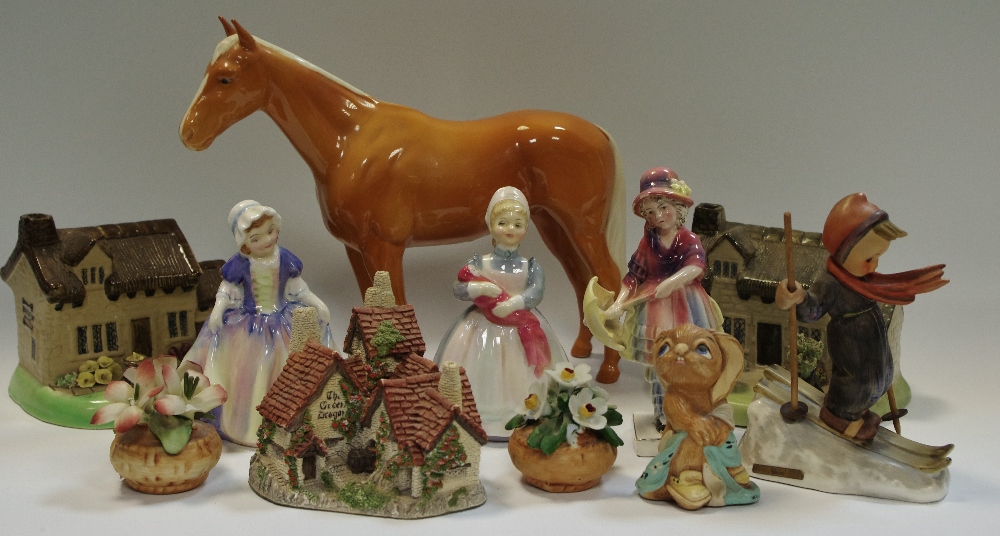 A Beswick horse; a Goebel Hummel skier figure; Royal Doulton DinkY Do;