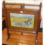 An oak fire screen with woodwork fox