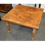 An oak coffee table, square top,