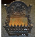 A 20th century fire grate and back plate