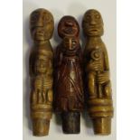 Tribal - Treen - a near pair of Pre Columbian type wooden carvings, one holding a child,