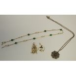 A Victorian 9ct gold pendant set with central emerald and three pearl drops;