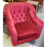 A Laura Ashley button back tub chair, in burgundy velour.