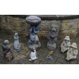Garden statuary - a reconstituted stone lion; cherub bird bath; mermaid; parrots; a wooden parrot;