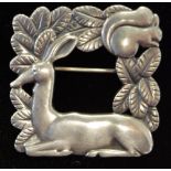 A Georg Jensen sterling silver square deer and squirrel brooch No.