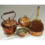 Copper - a graduated set of three heavy gauge saucepans; a large Victorian kettle, acorn finial, c.