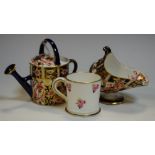 A Royal Crown Derby 2451 pattern miniature watering can; a similar miniature coal scuttle;