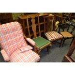 A Victorian mahogany button back salon chair, padded arms, scrolling terminals,