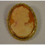 A 9ct gold cameo pendant brooch, Lady facing left, stamped 9 375, Sheffield 1986 import marks,