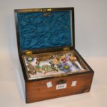 A late 19th Century jewellery box containing a quantity of vintage costume jewellery to include