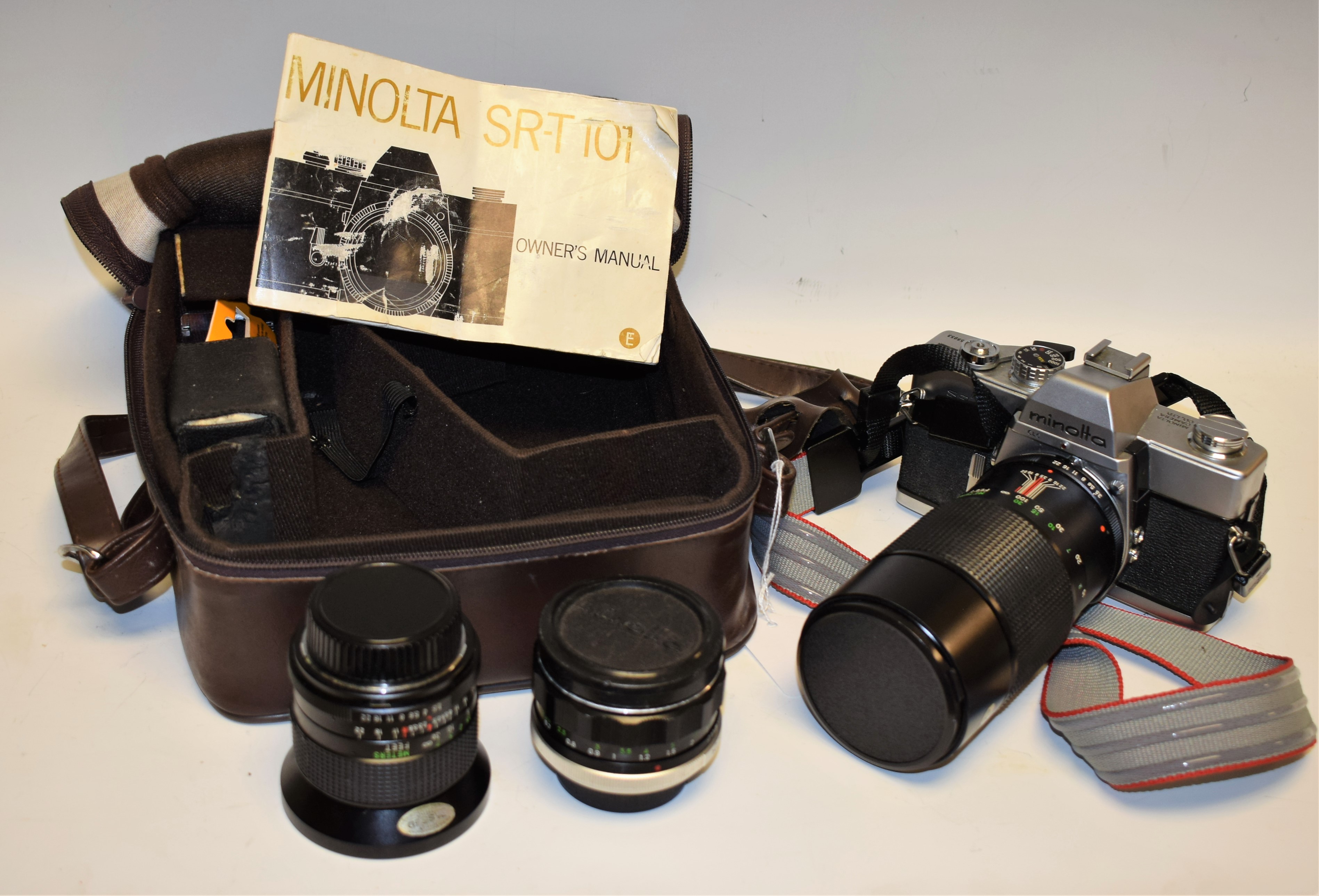 A Minolta SRT101 SLR camera, no 3558053, with original Rokkor-PF 58mm lens; others,