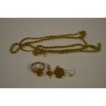 Jewellery - a pair of West African yellow metal earrings, as tribal totem mask earrings, unmarked,