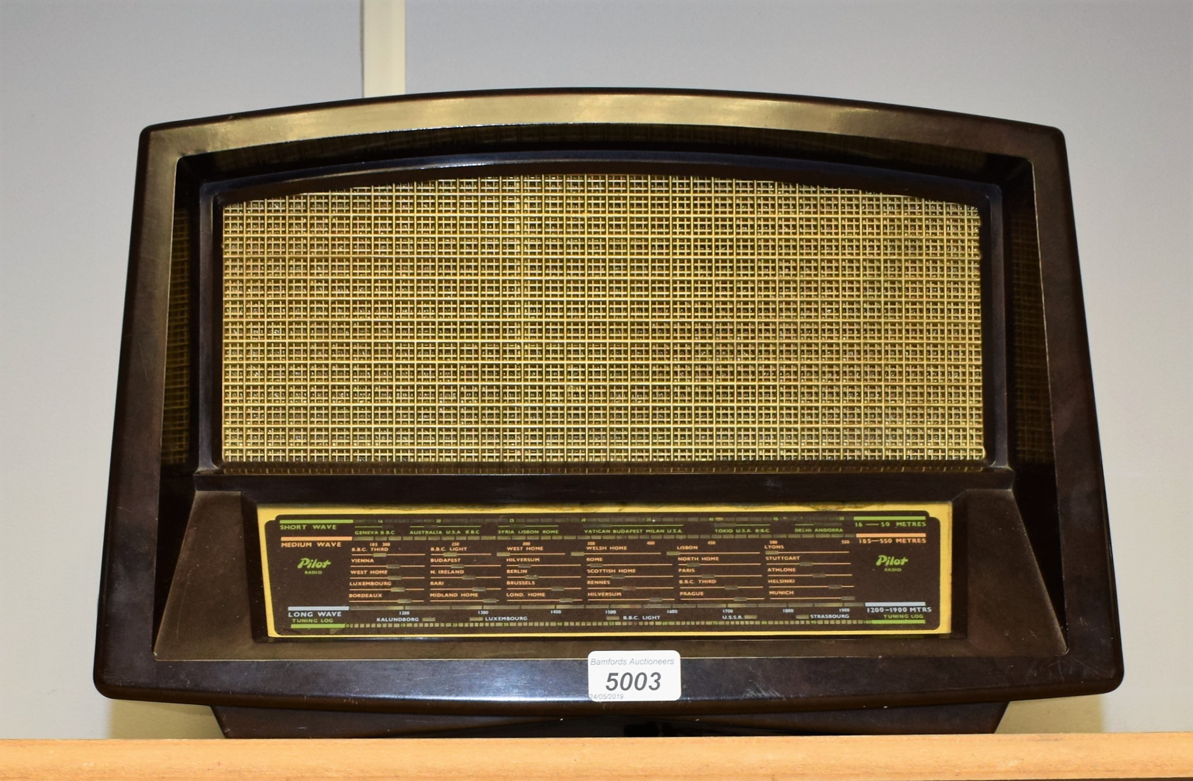 A retro vintage short, medium and long wave valve radio, by Pilot, London,