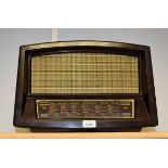 A retro vintage short, medium and long wave valve radio, by Pilot, London,