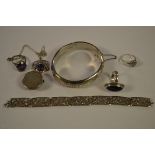 A silver hinged bracelet, chased foliate decoration, Joseph Smith,