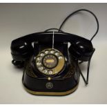 A vintage cast iron bell telephone, RTT56B,