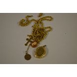 A 9ct gold rope link chain; a 9ct gold cross and chain; a 9ct gold locket etc,