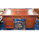 A 20th century mahogany twin pedestal writing desk,