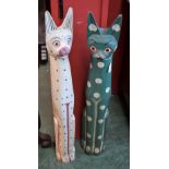 Tribal Art - a pair of large Indonesian softwood totems, as cats, picked out in colourful pigments,