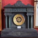 A French slate and marble clock, striking on a bell,