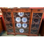 A George III style mahogany inverted break-centre bookcase,