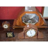 Clocks - an Art Deco inlaid walnut veneered mantel clock, silvered elongated octagonal dial,