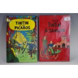 Two Herge's TinTin plaques - Tintin a Saigon, Tintin Et les Picaros.