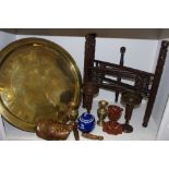 An Eastern brass top table; blue and white ginger jar; carved wood bust,