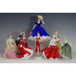 A Coalport figure, Sentiment; a Royal Doulton figure of the year,