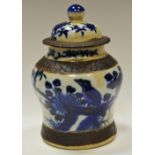 A Chinese blue and white crackle glazed jar and cover,