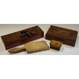 Treen - a cigarette case carved with a lion and other fauna; an early 20th century butter pat;