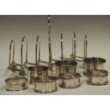 Silver and plate - a concertina action silver plate six section toast rack; silver napkin rings;