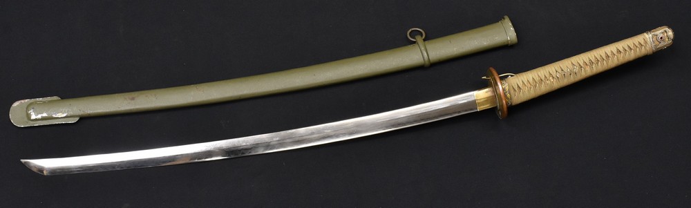 A Japanese World War Two period shin gunto sword , 66.