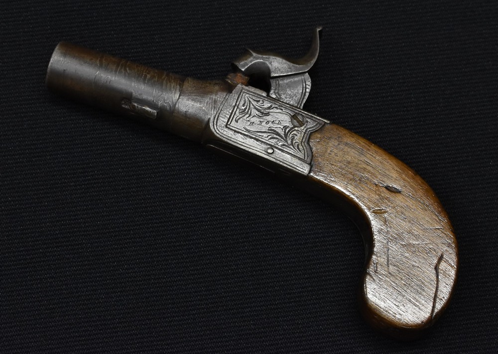 A George III percussion pocket pistol, 4.