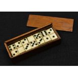 A set of twenty eight 19th century prisoner of war dominoes, the box with sliding cover,