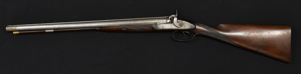 A 19th century 14 bore double barreled muzzle loading percussion shotgun, byWilliam Moore, London,