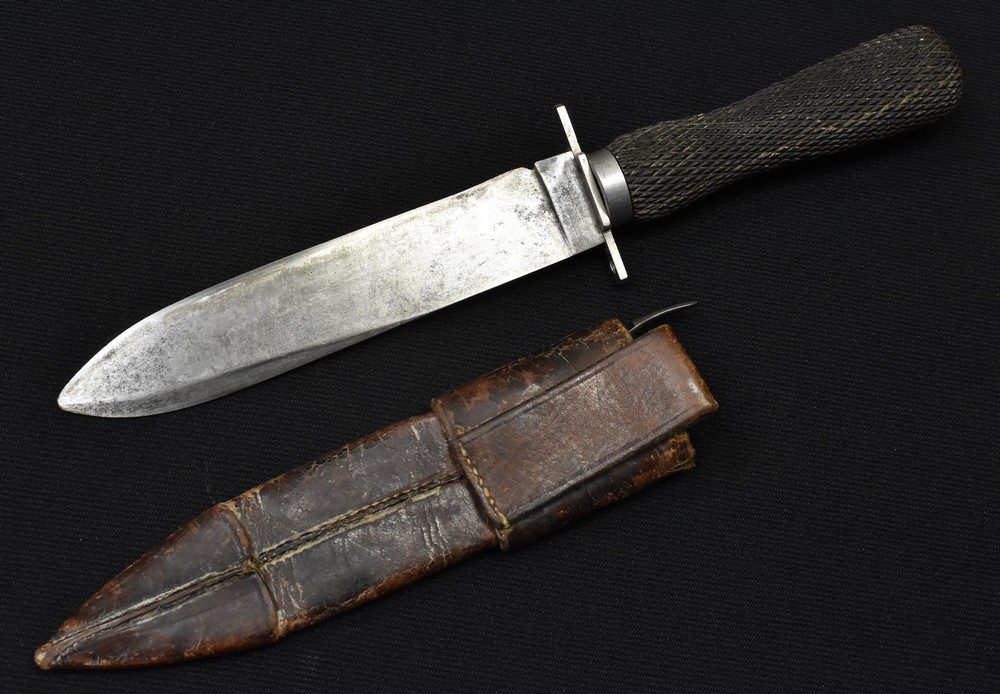 A Victorian spear pointed bowie knife, the blade marked at the ricasso "FISHER",