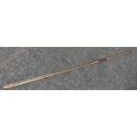 A Maasai lion spear, 88cm fullered blade, hardwood grip, spike pommel, 166cm long overall, c.