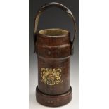 An early 20th century leather shell carrier,
