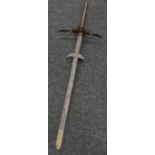 A substantial 19th century Historicist iron funerary sword, of Medieval form,