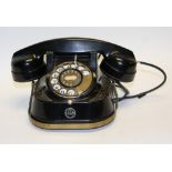 A vintage cast iron bell telephone, RTT56B,