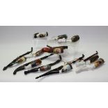 A collection of German porcelain pipes, mostly printed in polychrome, various subjects, portraits,