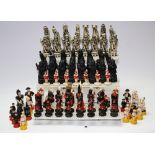 Chess - a novelty painted wooden chess set;