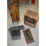 A Cossor 1930's radio; a Singer sewing machine; an Imperial typewriter;