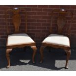 A pair of Queen Anne Revival walnut and mahogany side chairs,