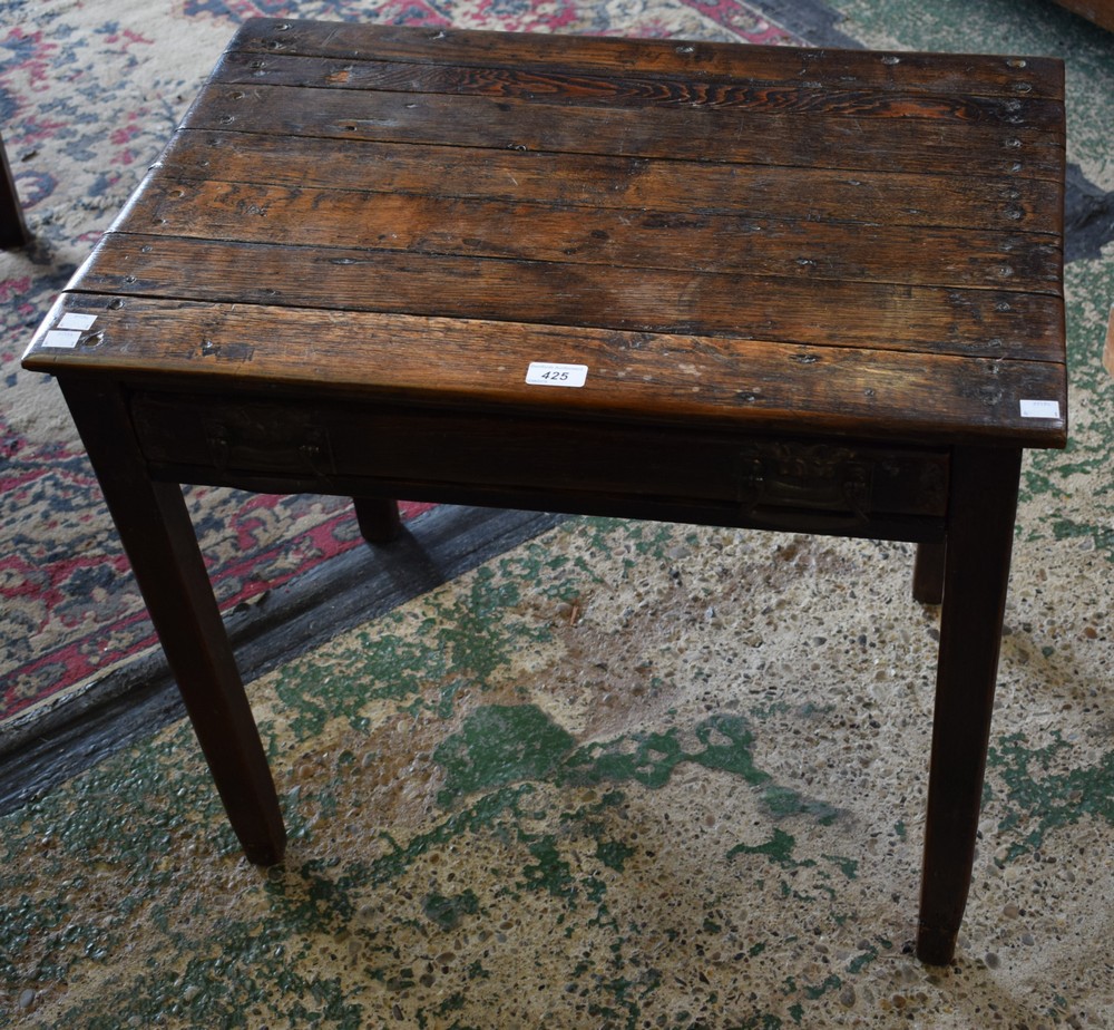 An early 20th century oak side table, rectangular planked top above a frieze drawer, square legs,