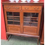 A 20th century mahogany bookcase,