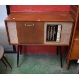 A mid-20th century Ekco Stereogram, dansette type legs,