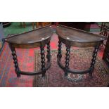 A pair of Jacobean Revival oak demi-lune side/console tables,